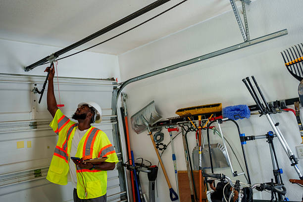 Professional Garage Door Panel Replacement technician working in Kensington, NY
